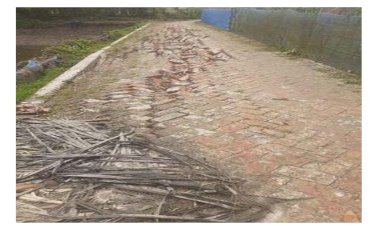 রাজবাঁধ ঠাকুরুন তলা রাস্তাটি বছর না যেতেই ভেঙ্গে পড়েছে