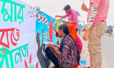 আত্রাইয়ে দেয়ালে নতুন বাংলাদেশ গড়ার প্রতিচ্ছবি