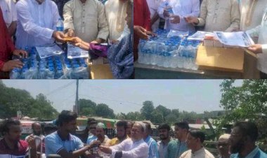 নওগাঁ জেলা শাখার উদ্যোগে ড্যাব আয়োজিত শ্রমজীবী মানুষের মাঝে খাবার স্যালাইন ও পানি বিতরণ