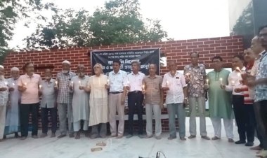 নওগাঁর ধামকুড়ি বধ্যভূমি চত্বরে গণহত্যার শহিদদের প্রতি শ্রদ্ধাঞ্জলি ও মোমবাতি প্রজ্জ্বলন