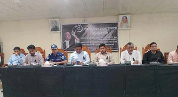 পোরশায় গণহত্যা দিবসে আলোচনা সভা অনুষ্ঠিত
