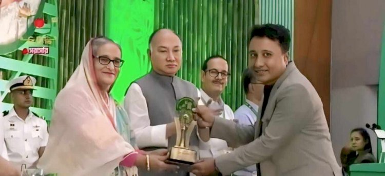 গাছ লাগিয়ে প্রধানমন্ত্রীর নিকট থেকে স্বর্ণপদক পেলেন কালুখালীর রাসেল