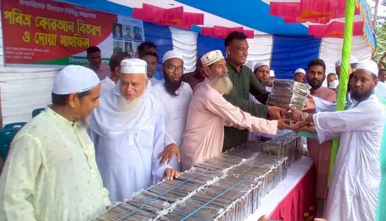 নওগাঁ প্রবাসীদের উদ্যোগে বিভিন্ন মাদ্রাসায় কোরান শরীফ বিতরণ ও দোয়া মাহফিল অনুষ্ঠিত