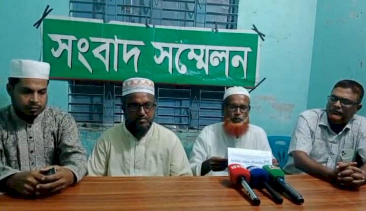 ধামইরহাটে অধ্যক্ষকে প্রাণনাশের হুমকির প্রতিবাদে সংবাদ সম্মেলন